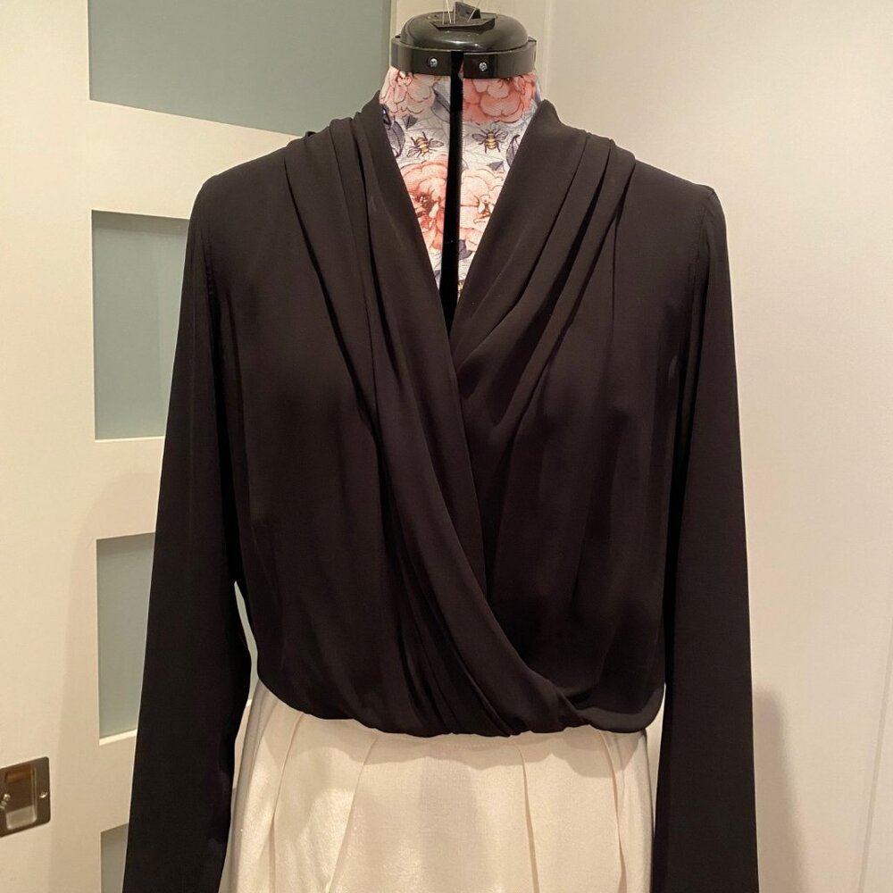 Babaton faux-wrap blouse in black chiffon.